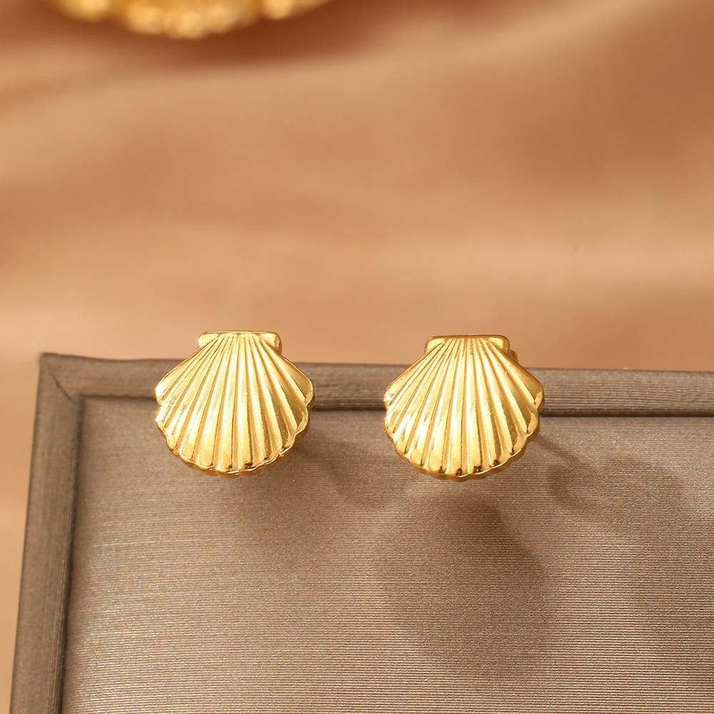 Bijou minimaliste, boucle d'oreille en acier inoxydable, style coquillage unique.