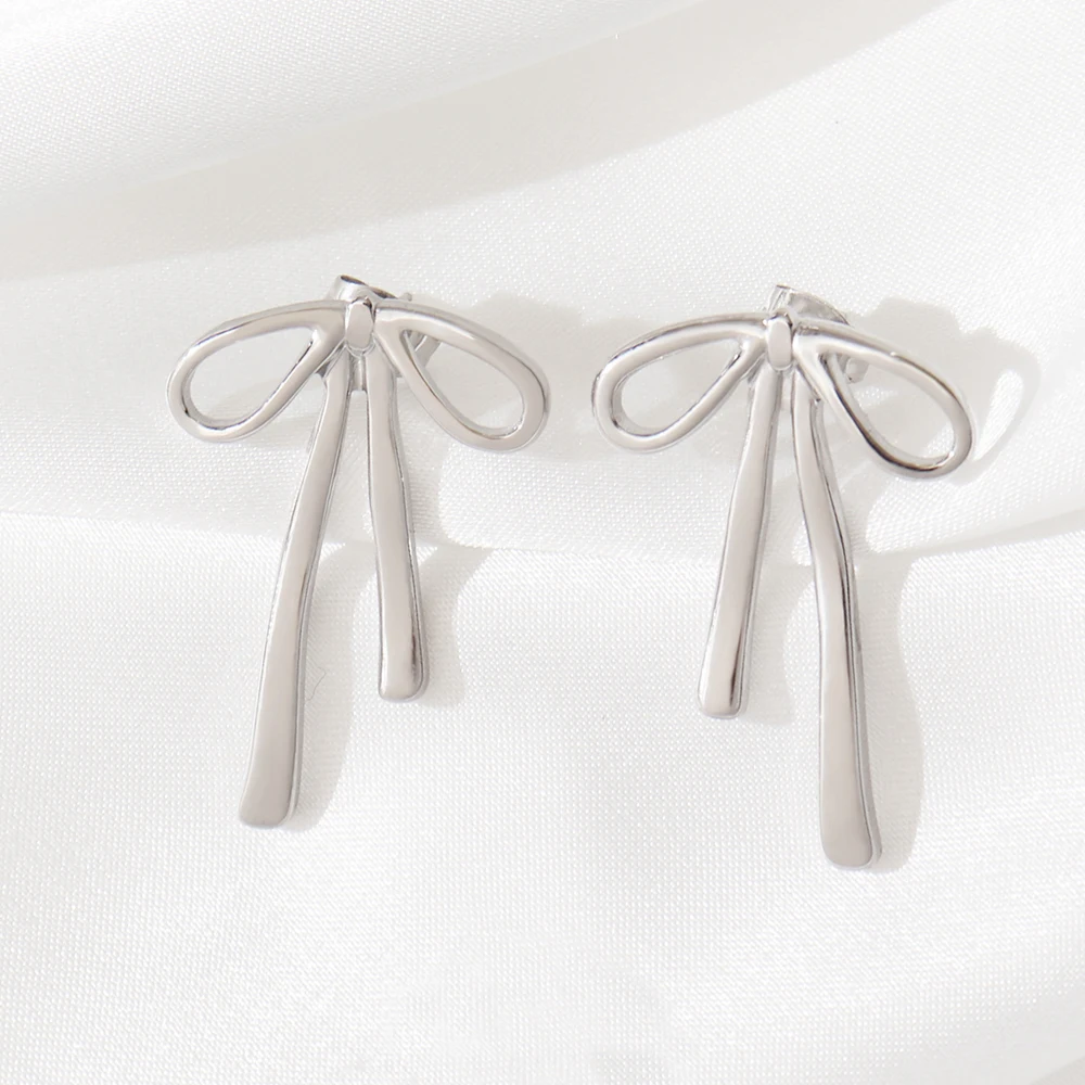 Élégantes boucles d'oreilles en acier inoxydable noeud pour femmes