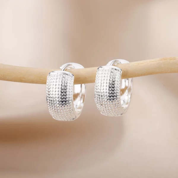 Boucles d'oreilles en acier inoxydable, design moderne avec facettes étincelantes