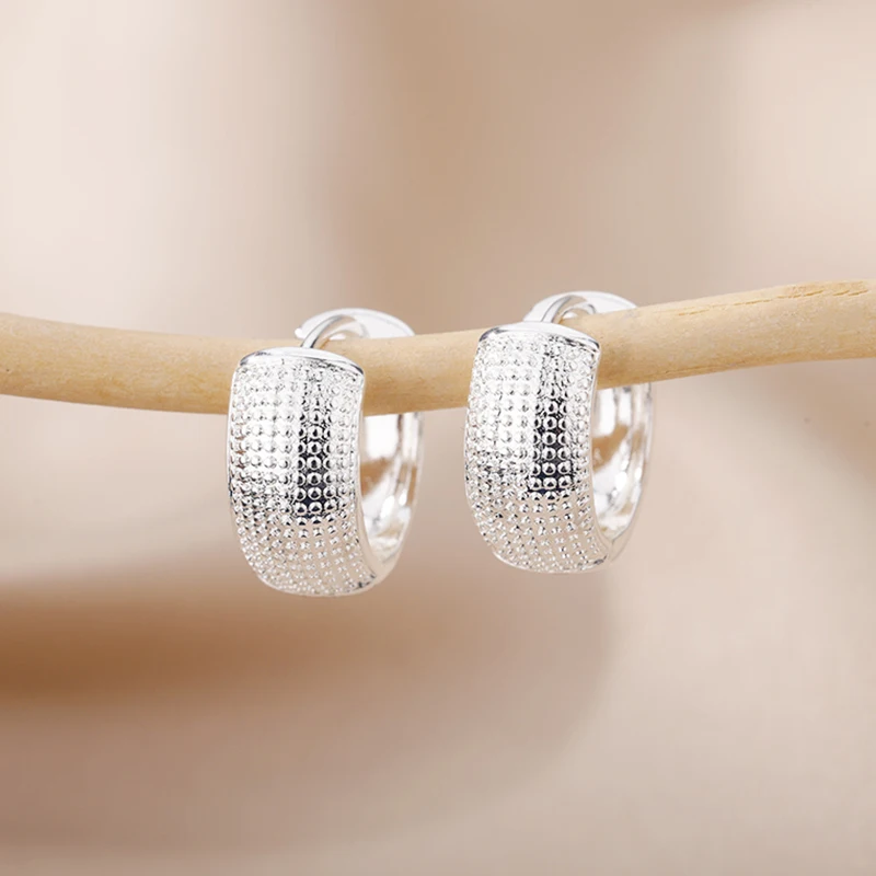Boucles d'oreilles en acier inoxydable, design moderne avec facettes étincelantes