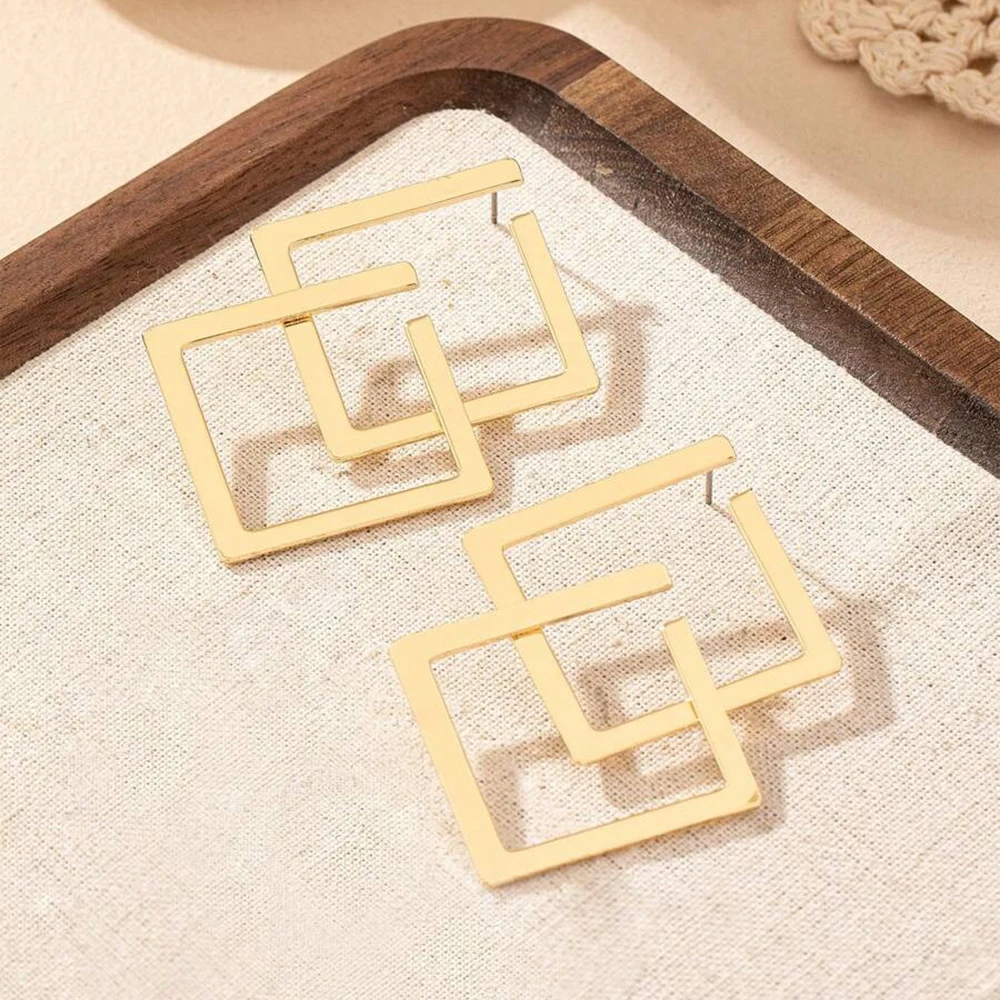 Bijou en acier inoxydable forme losange pour femme