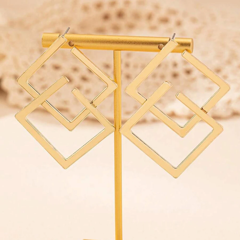 Boucle d'oreille tendance en acier inoxydable losange