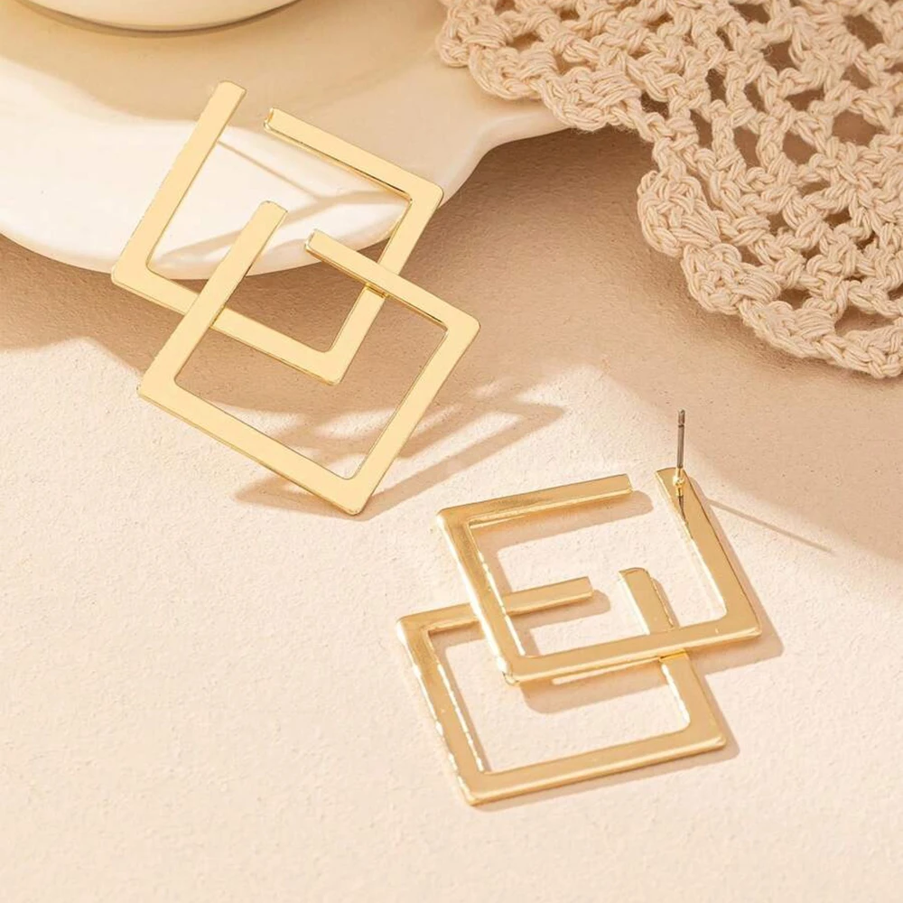 Boucle d'oreille losange en acier inoxydable élégant