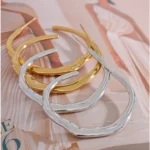 Boucle d'oreille originale en acier inoxydable, design irrégulier et chic