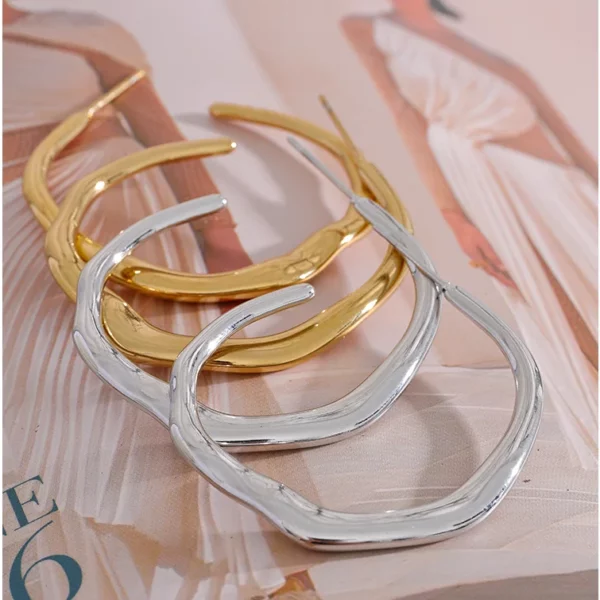 Boucle d'oreille originale en acier inoxydable, design irrégulier et chic