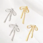 Boucles d'oreilles en acier inoxydable avec motif de noeud intemporel