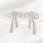 Élégantes boucles d'oreilles en acier inoxydable noeud pour femmes