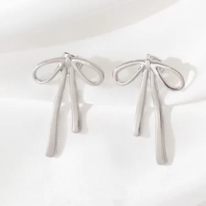 Élégantes boucles d'oreilles en acier inoxydable noeud pour femmes