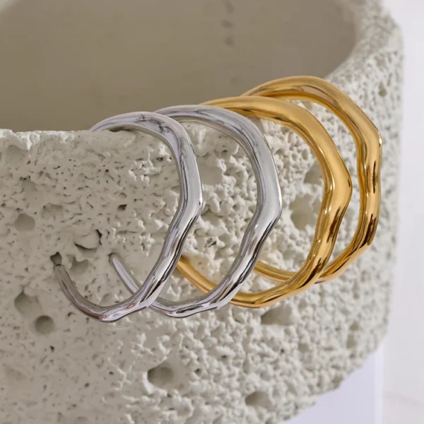 Bijoux tendances, boucle d'oreille en acier inoxydable irrégulière pour femme