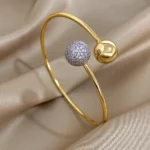 Bijou en acier inoxydable avec design boule, idéal pour offrir