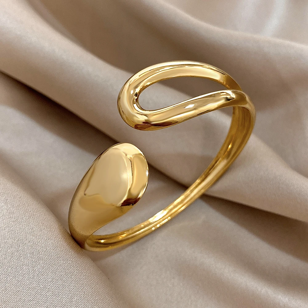 Bracelet asymétrique en acier inoxydable, accessoire incontournable