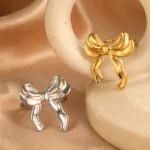 Accessoire mode, bague acier inoxydable avec un joli noeud boucle